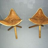 Pairs of leather tripod stools
