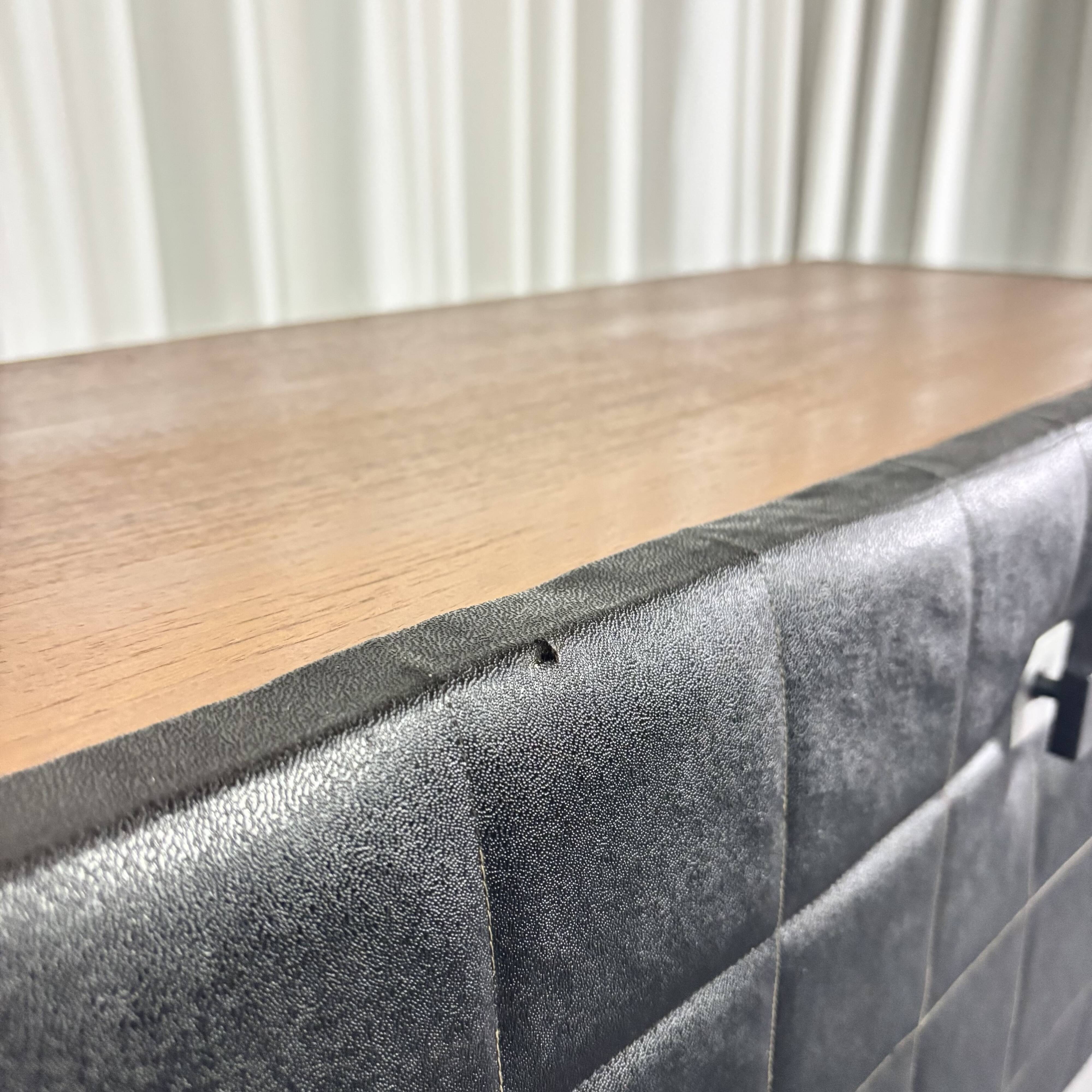 Modernist lowboard, faux leather, wood and stainless steel, 1960.