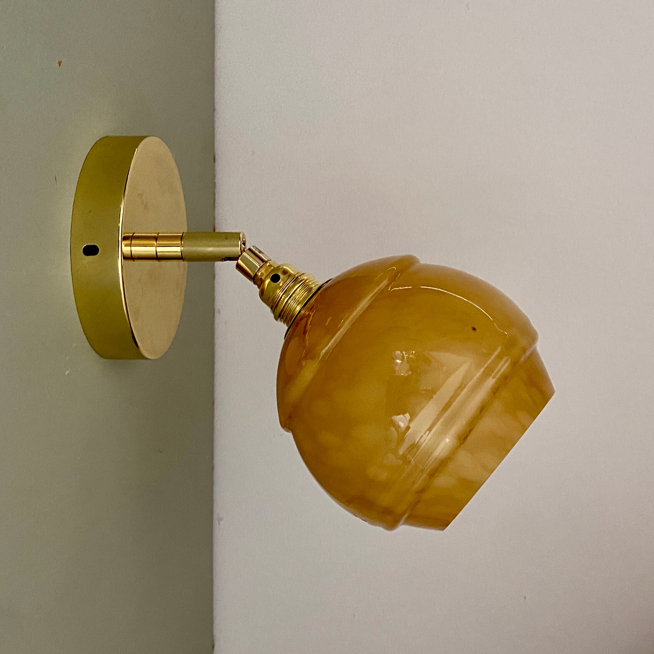 Vintage globe wall light in yellow Clichy glass