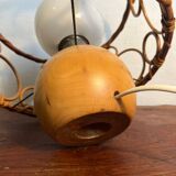 Solid wood table lamp with opaline wicker globe