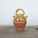 Old gargoulette pot in glazed terracotta