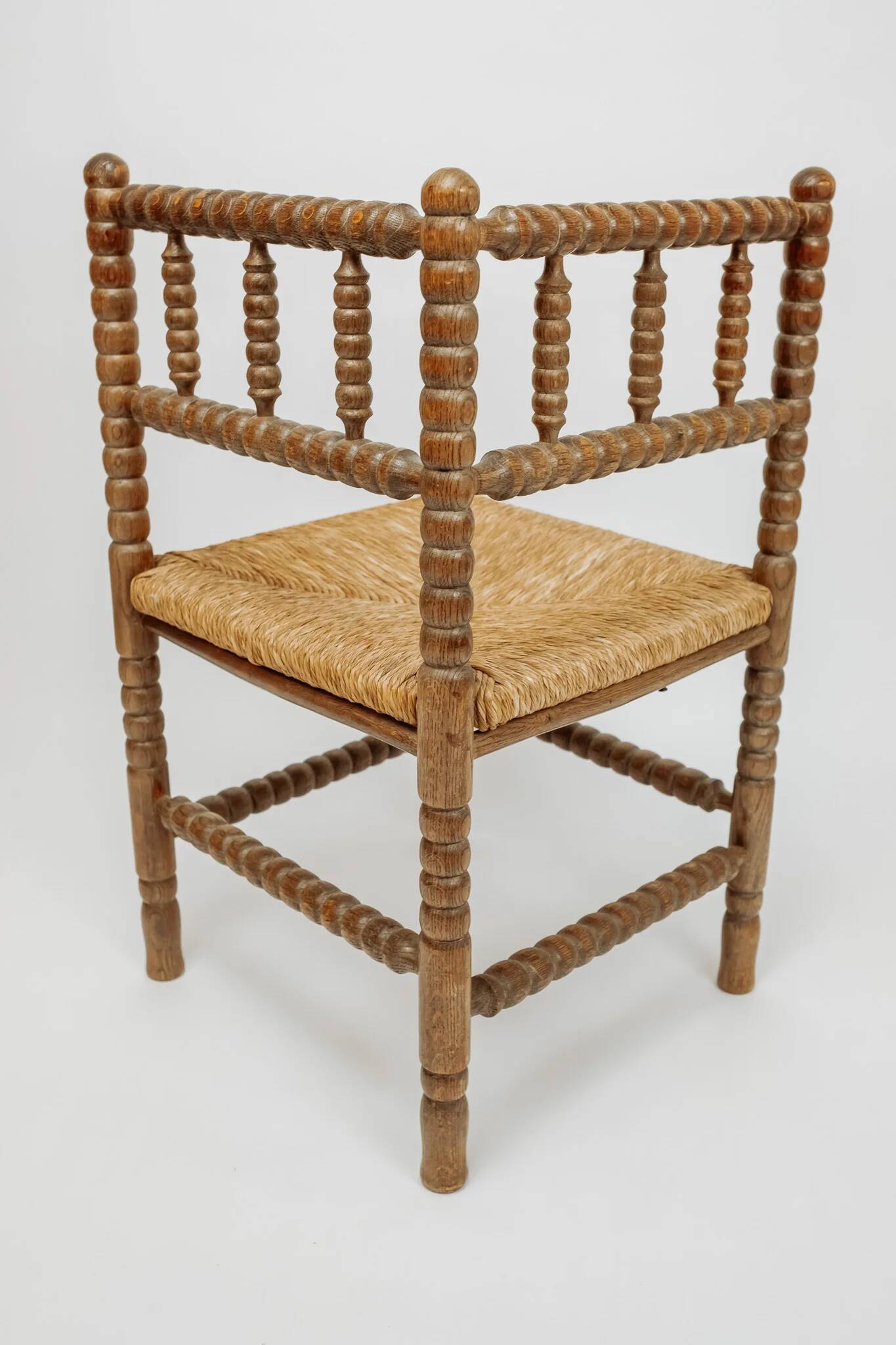 Classic vintage bobbin corner armchair