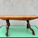 Brutalist bench made of vine and olive wood.