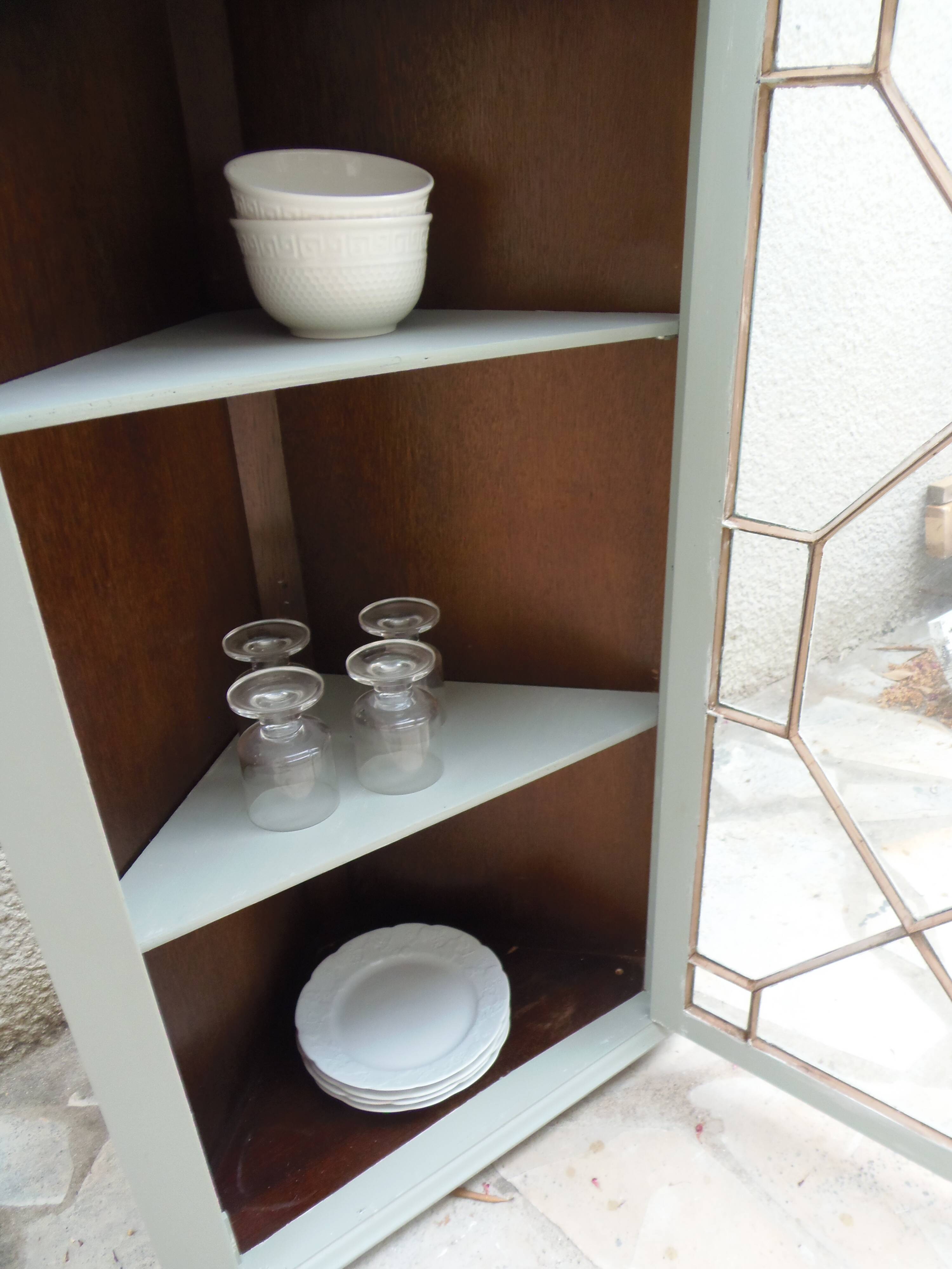 Vintage English corner display cabinet enhanced in grey-green with a wooden top.