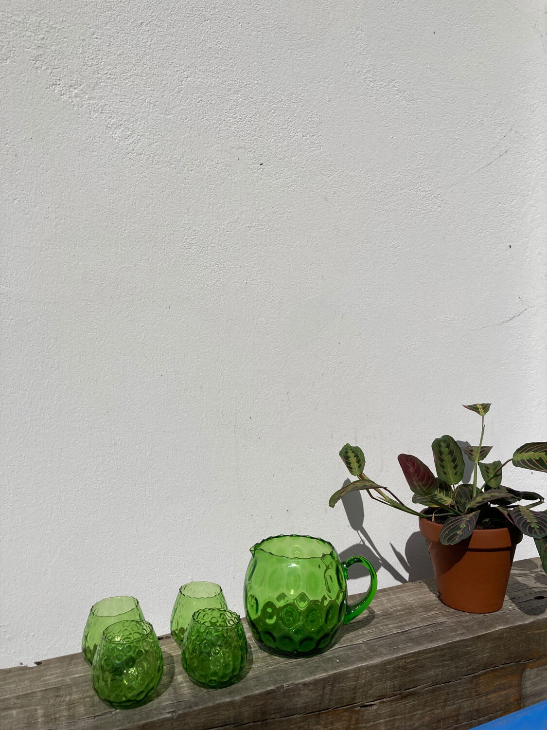 4 green water glasses and vintage blown glass carafe
