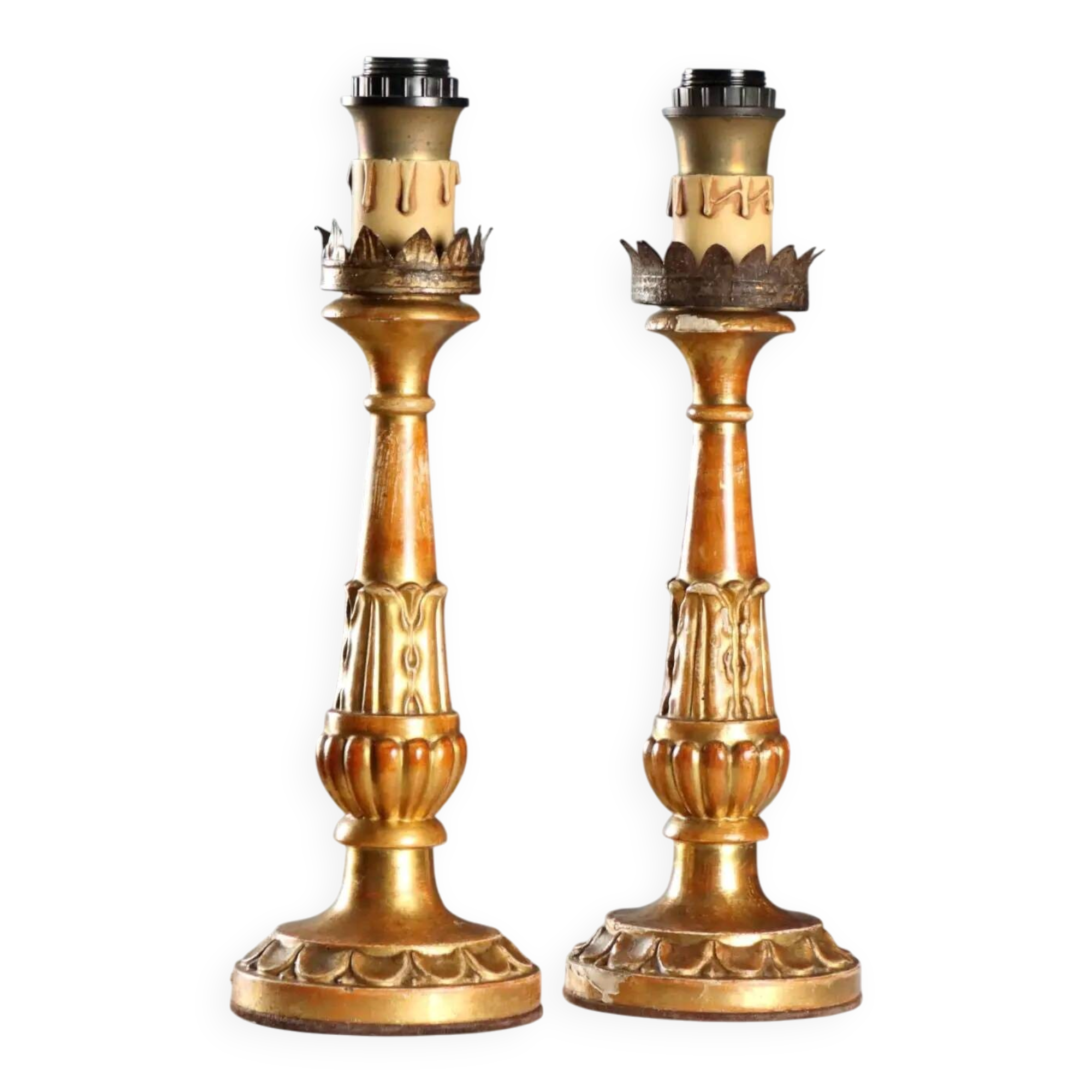 Pair of antique carved and gilded wooden candlesticks, Italy, 19th century.