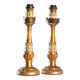 Pair of antique carved and gilded wooden candlesticks, Italy, 19th century.