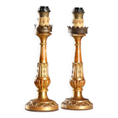 Pair of antique carved and gilded wooden candlesticks, Italy, 19th century.