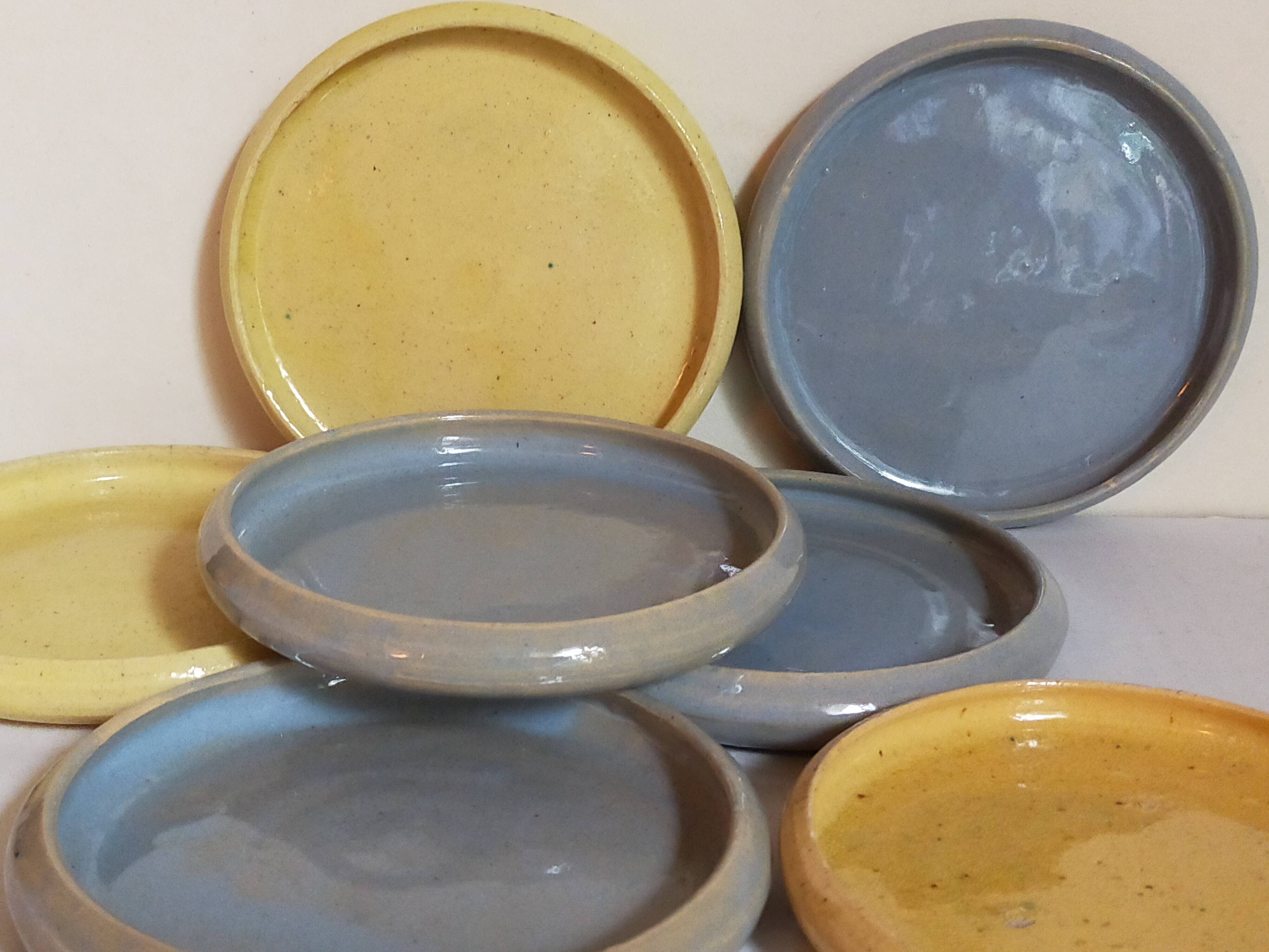 Seven vintage potter's sweet treat plates