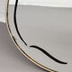 Rearview mirror and screen-printed free-form 60s on gilded frame