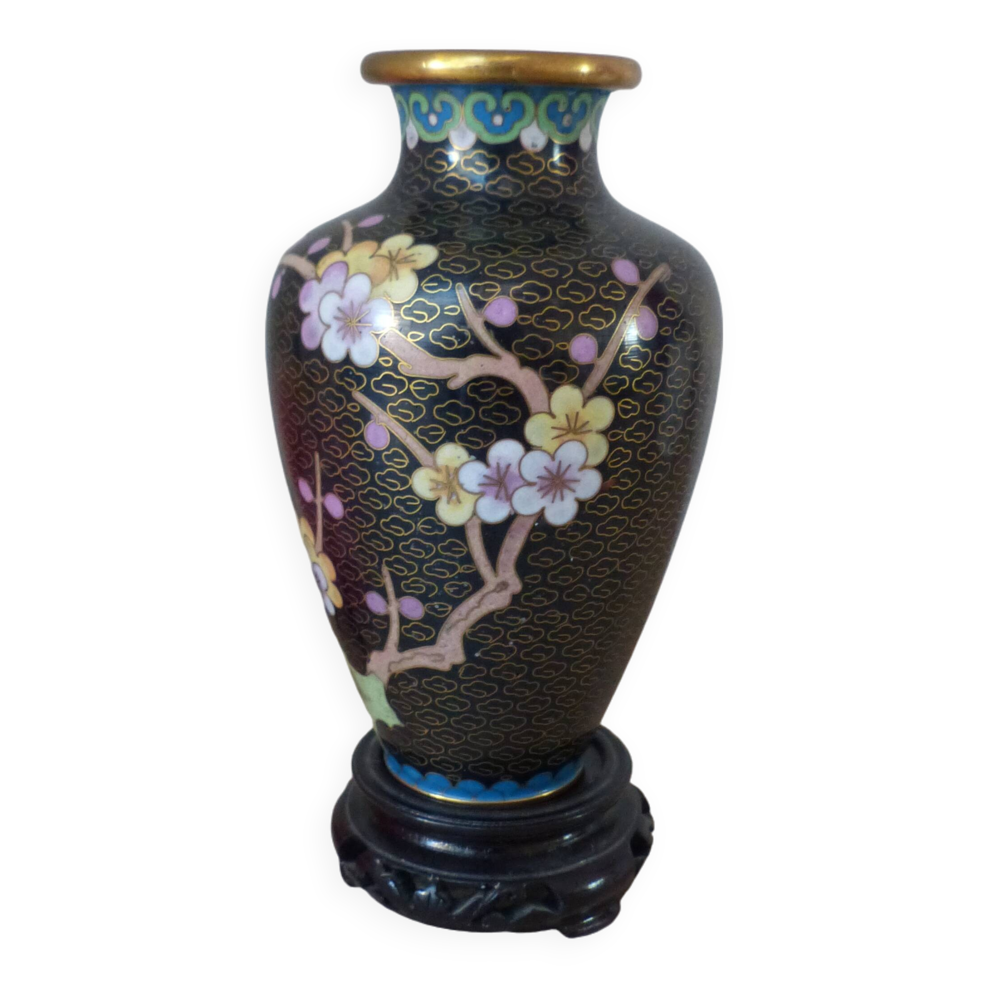 Small black cloisonné vase decorated with yellow and pink cherry blossoms, vase on wooden base