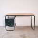 Desk with bauhaus style tubular steel chair