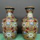 Pair of Chinese bronze vases decorated with cloisonné enamel.