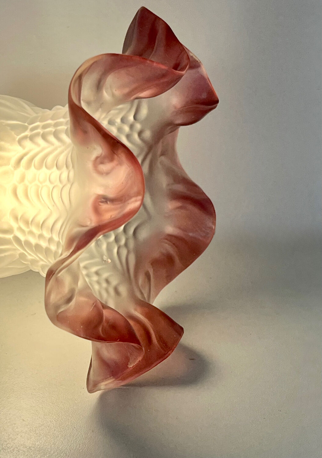 Pair of porcelain wall lights with pink glass tulips, Art Deco.