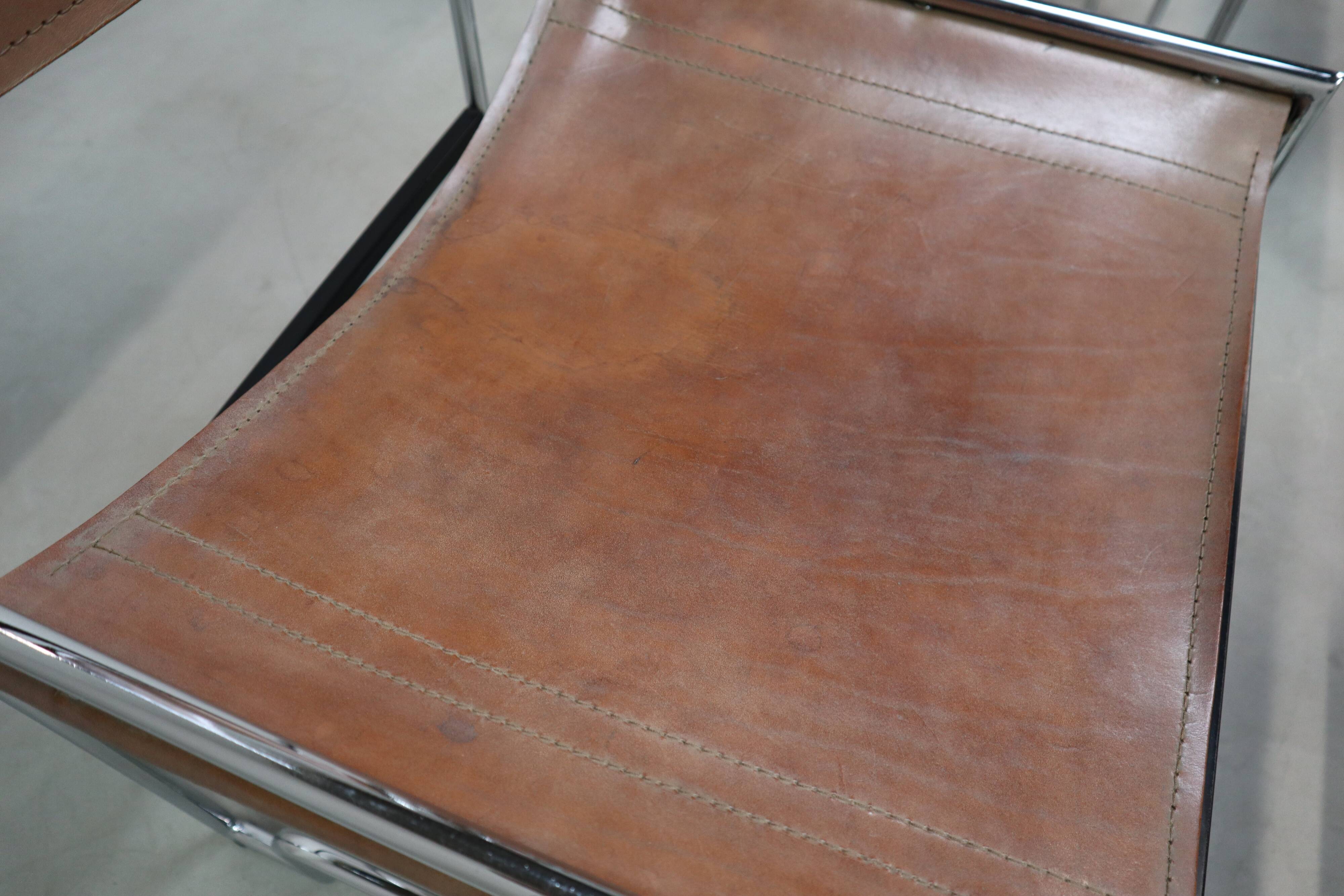Set of 6 modernist chrome and leather dining chairs, 1970's