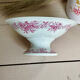 Magnificent antique compote fine porcelain with pink floral decoration.