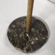 Gold metal standing ashtray and black marble base