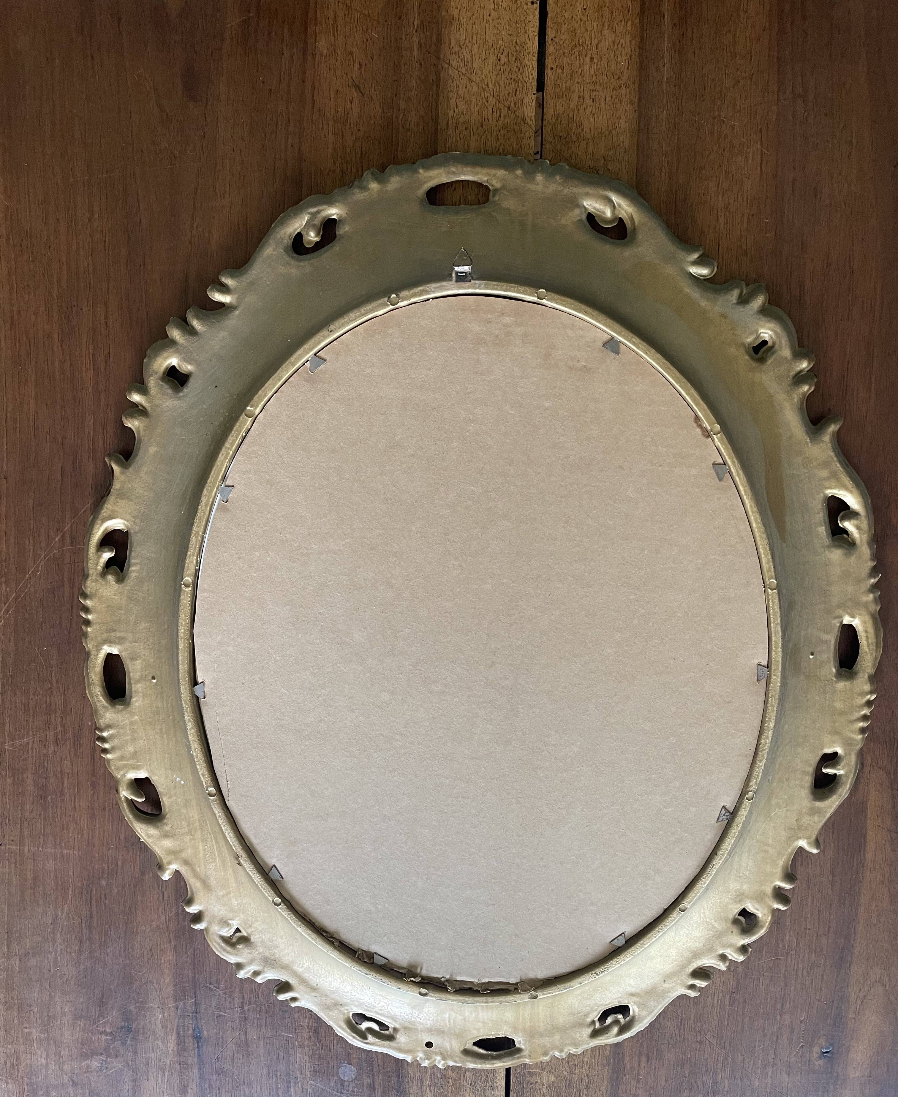 Kitsch 70s gold resin oval mirror