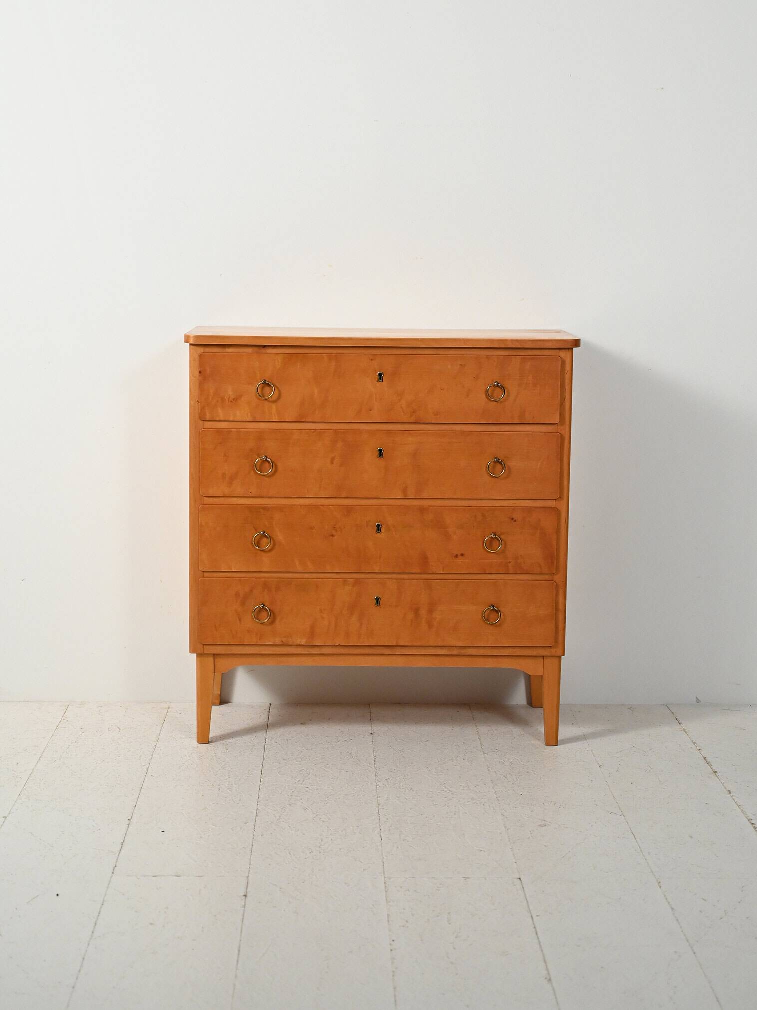 Scandinavian 1950s birch chest of drawers with brass handles