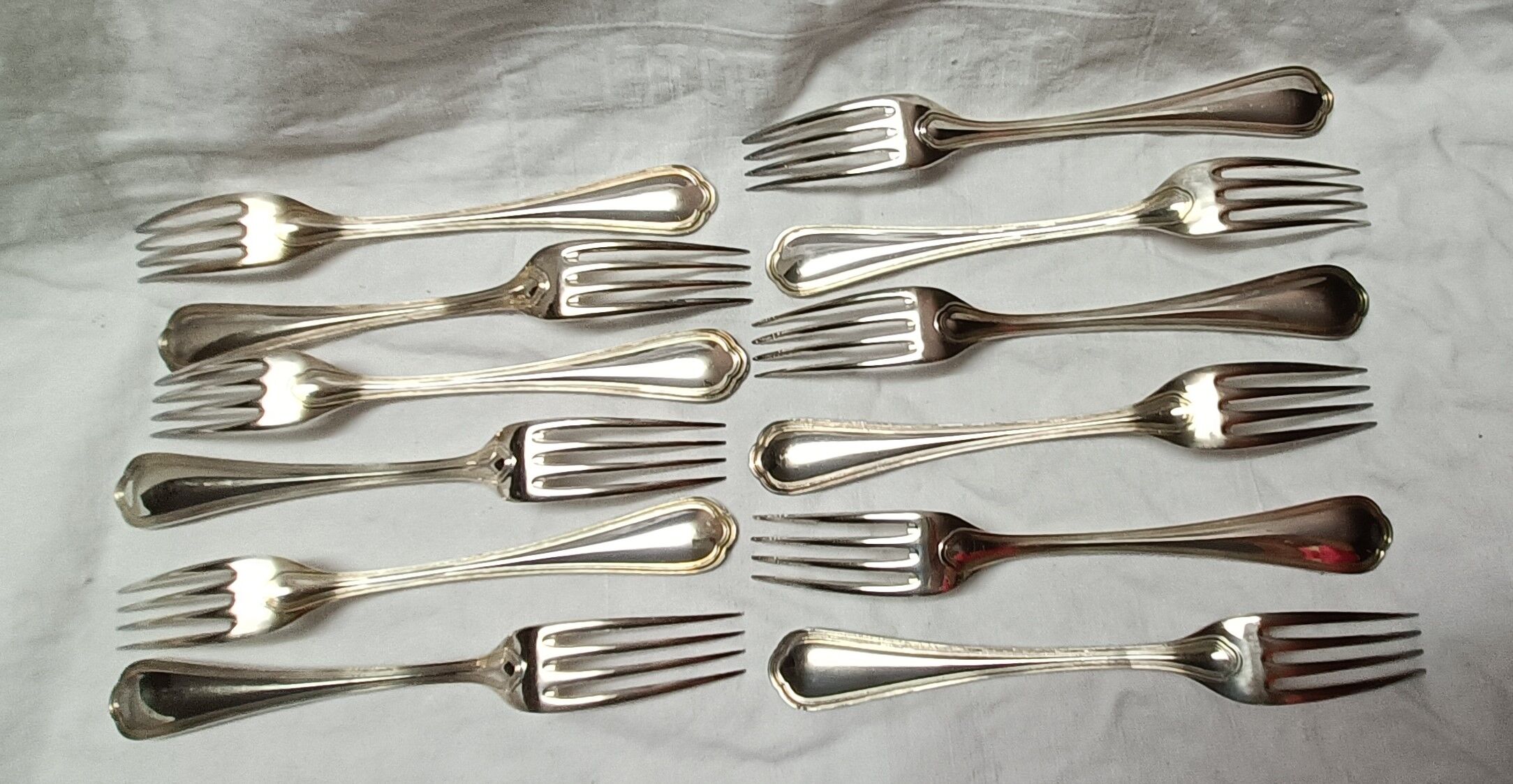 Set of 12 silver metal table forks from christofle model "spatours"