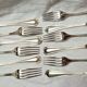 Set of 12 silver metal table forks from christofle model "spatours"