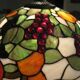 Tiffany-style lampshade with fruits and grapes