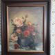 Antique oil painting depicting a bouquet of roses