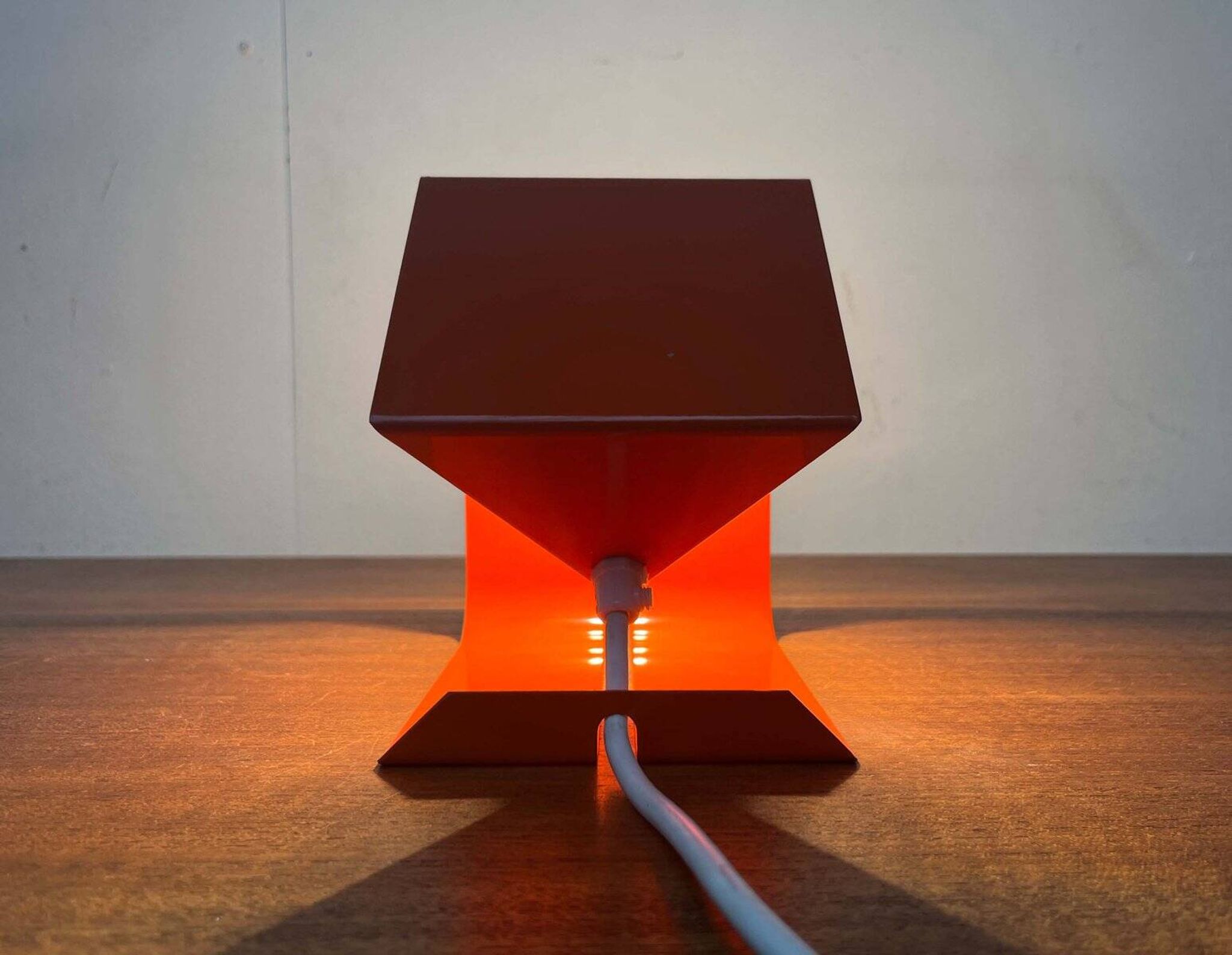 Orange metal table lamp, minimalist, modern mid-century space age, 1960s.