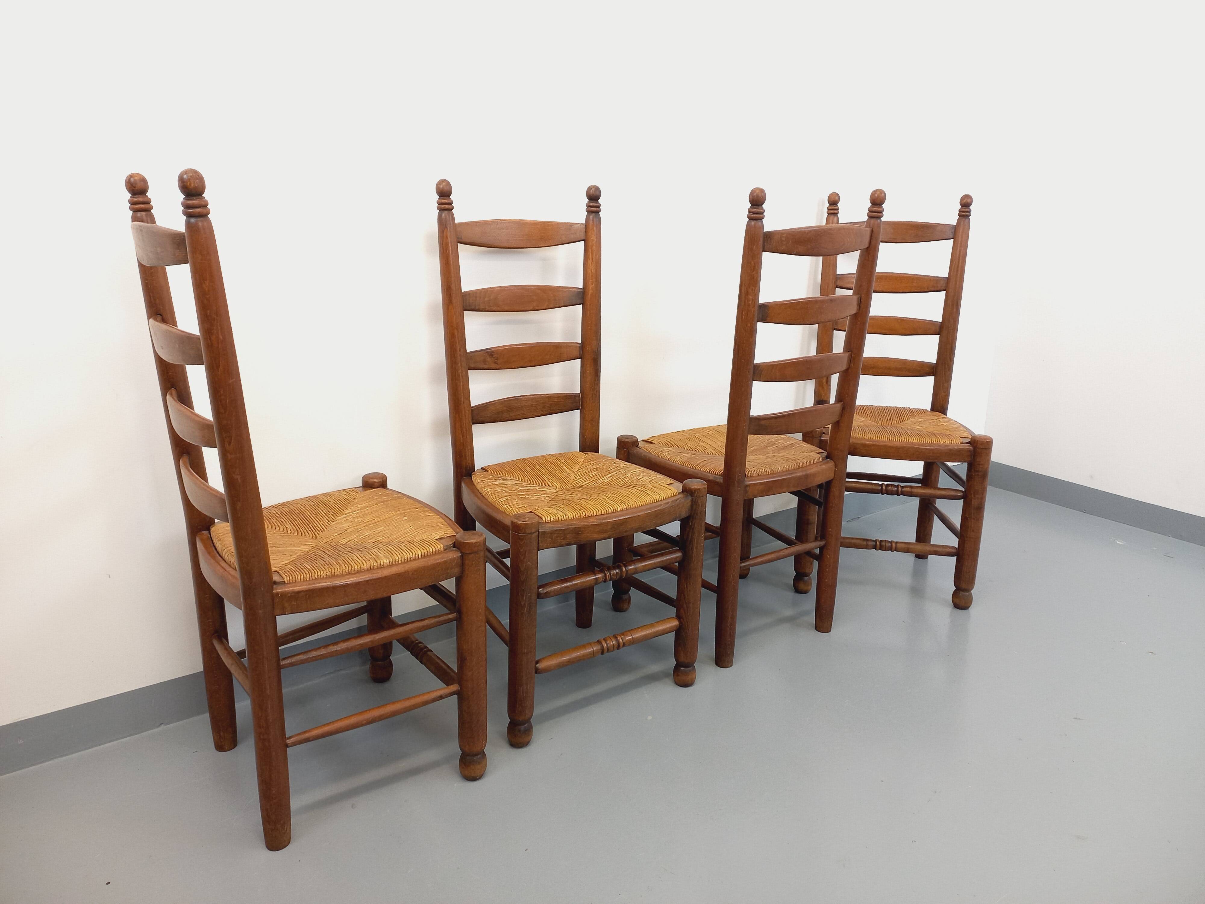 Set of 4 vintage brutalist Charles Dudouyt chairs in wood and straw from the 60s