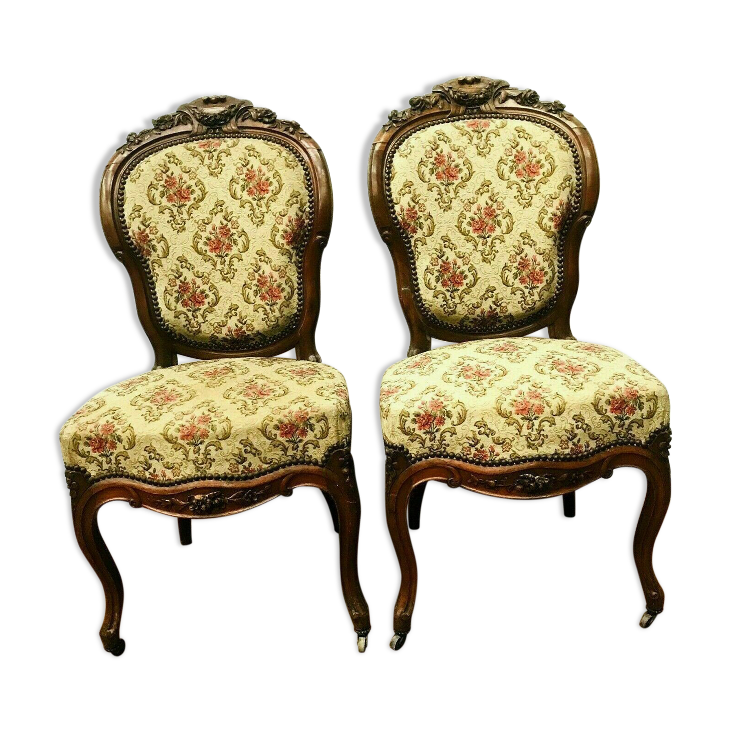 Pair of Napoleon III chairs in 19th century carved mahogany