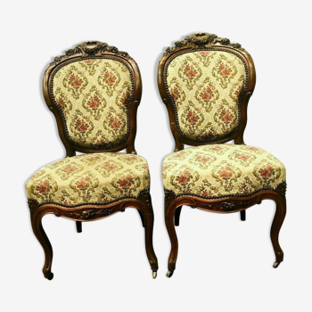 Pair of Napoleon III chairs in 19th century carved mahogany