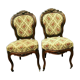 Pair of Napoleon III chairs in 19th century carved mahogany