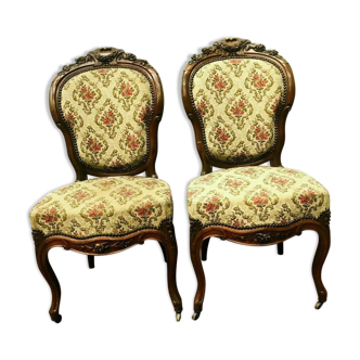 Pair of Napoleon III chairs in 19th century carved mahogany