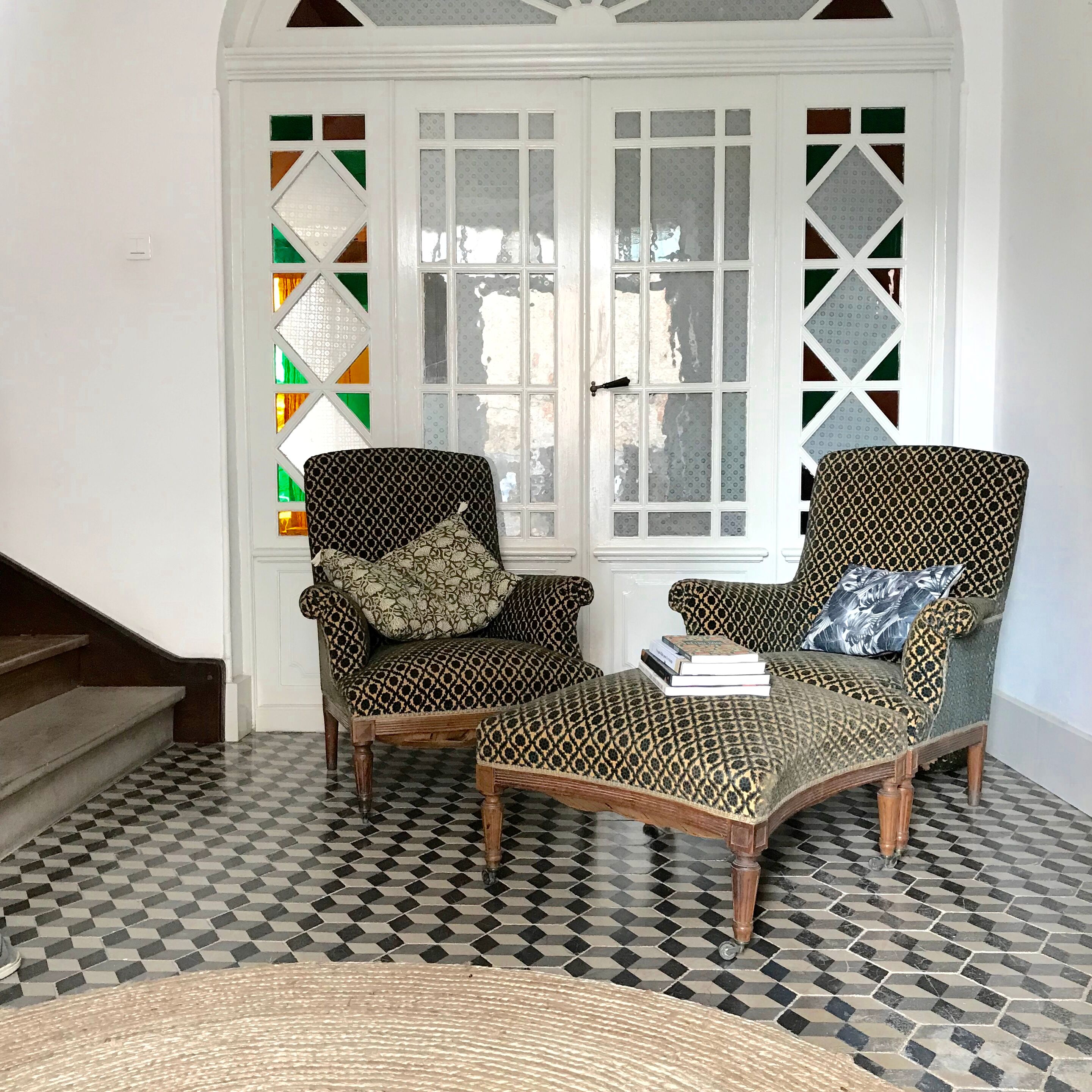 Vintage armchairs and rests feet