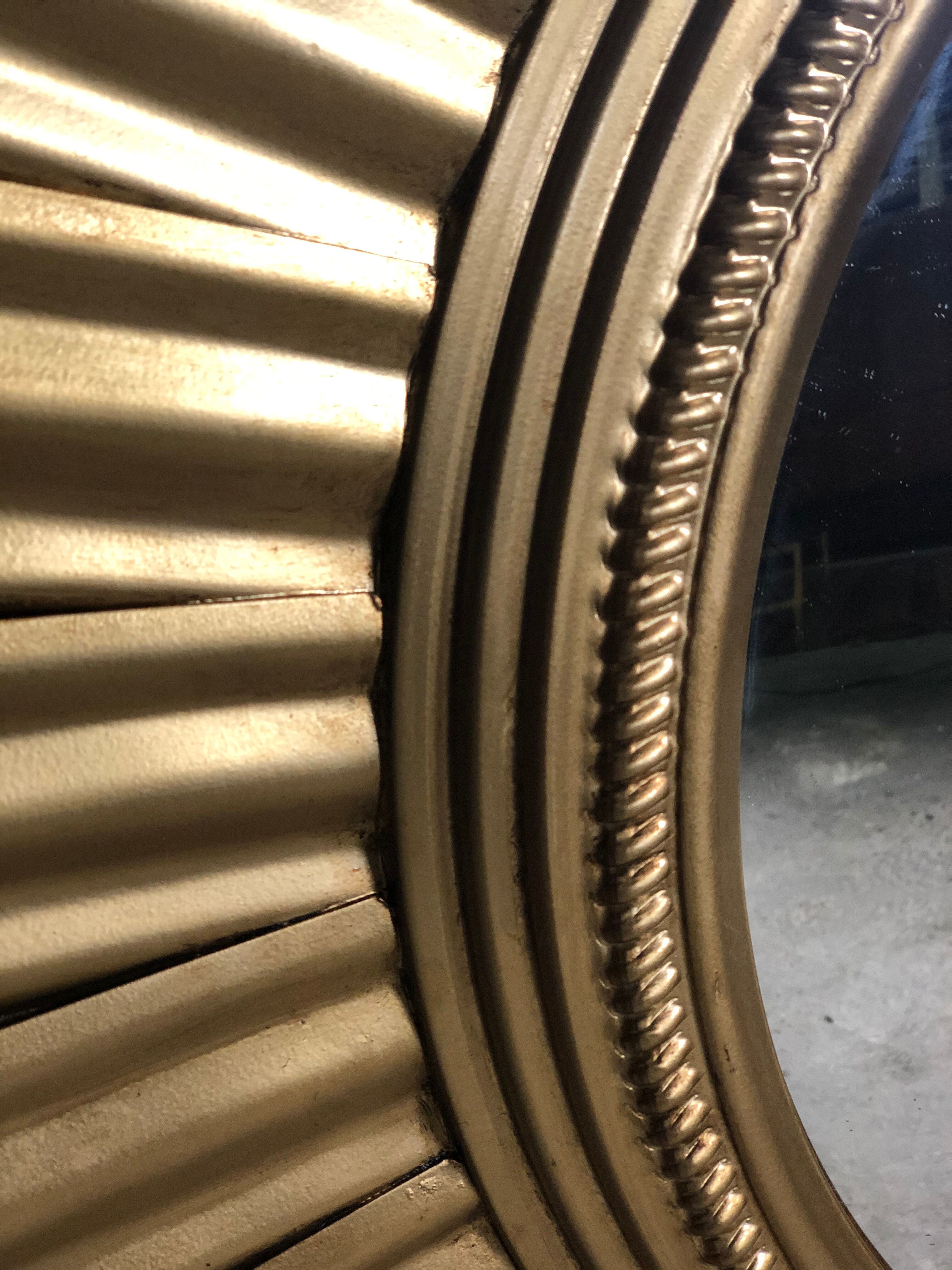 Sun mirror "André" in gilded sheet metal witch eye