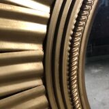 Sun mirror "André" in gilded sheet metal witch eye