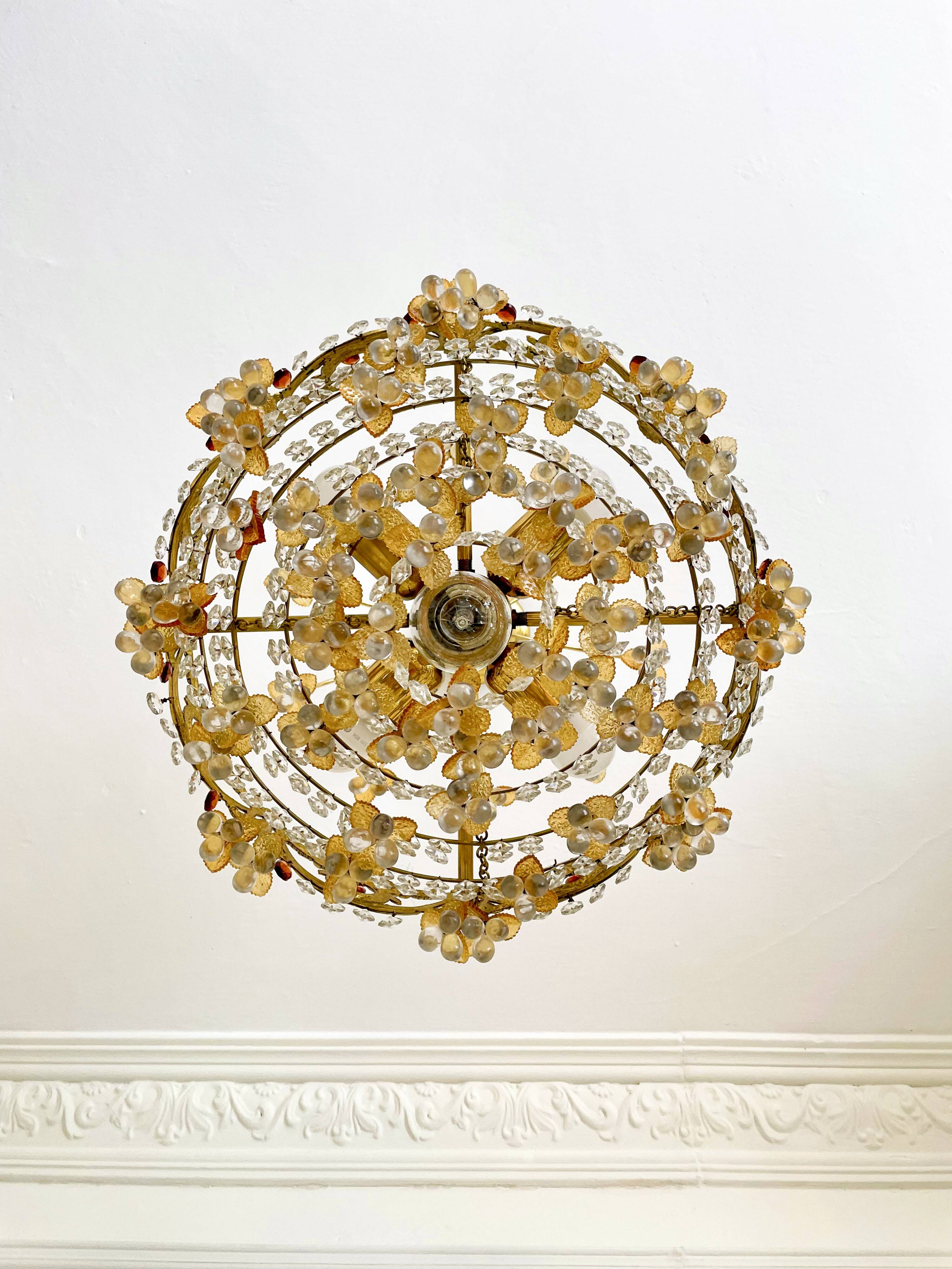 Exceptional vintage chandelier in Murano style crystal, orange, brass.