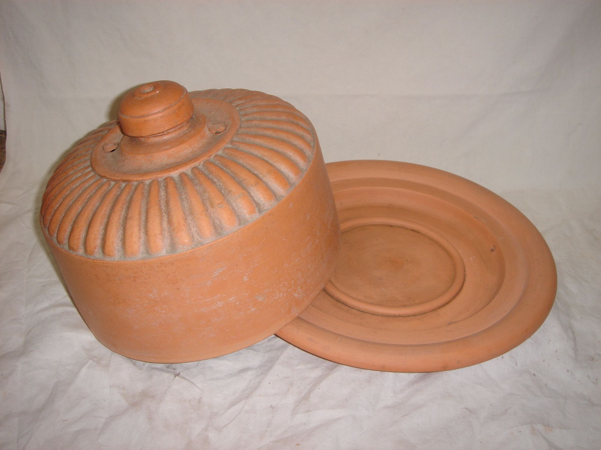Terracotta butter for clod with salt crystals