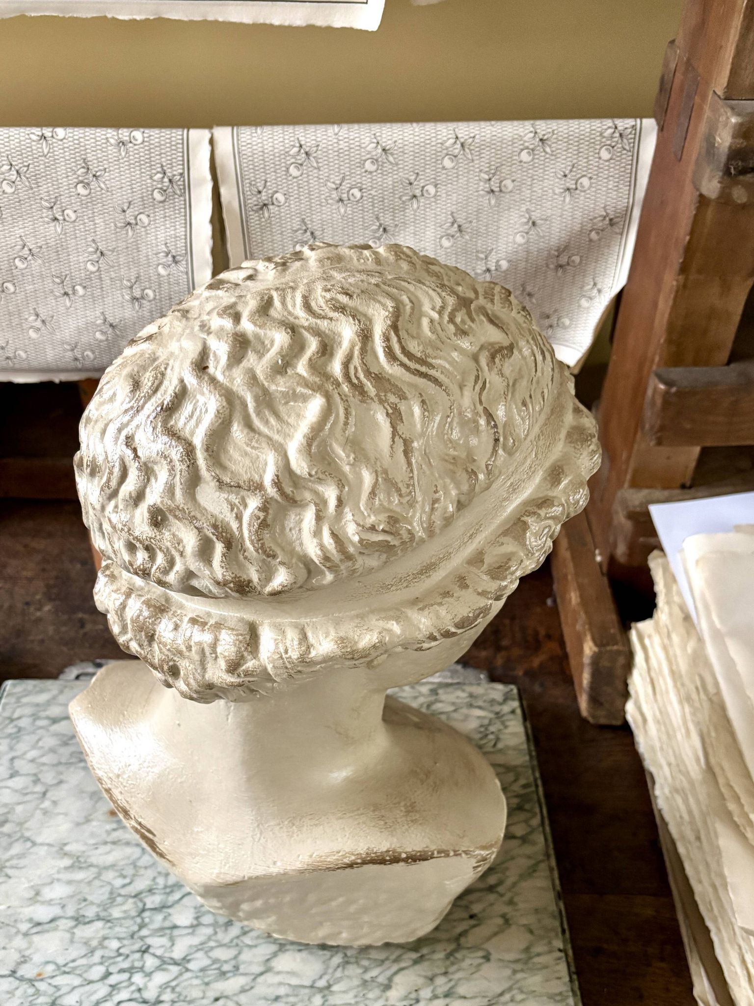 Concrete bust painted in beige - reproduction, detail of "The Dying Slave"