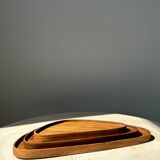 Trio of rounded triangular shaped trays or cups in monoxyl teak