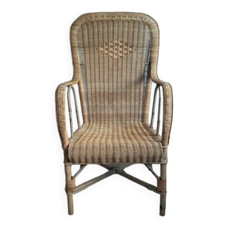 Vintage woven rattan armchair.