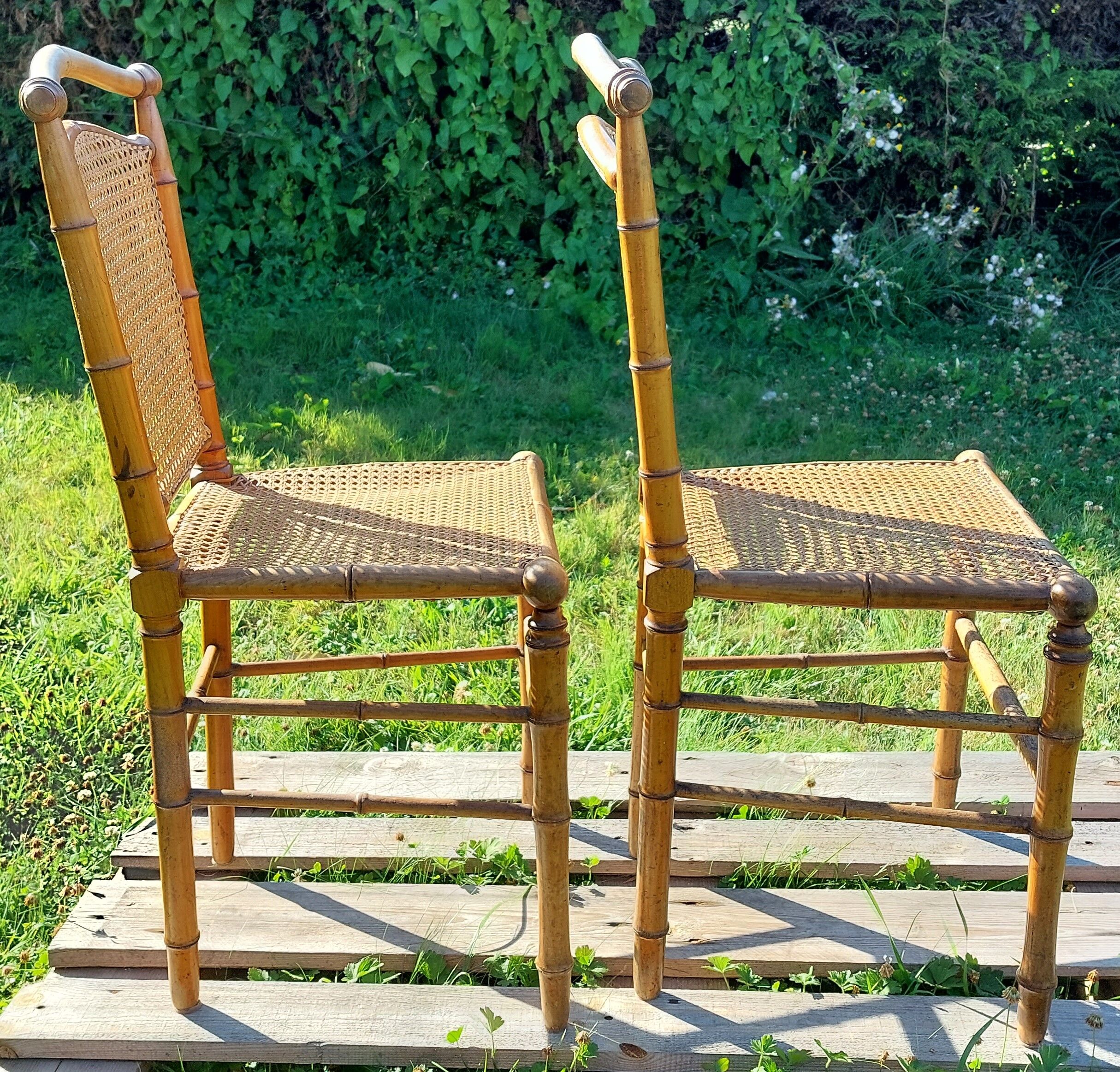 Duo of wooden chairs turned bamboo style