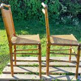 Duo of wooden chairs turned bamboo style