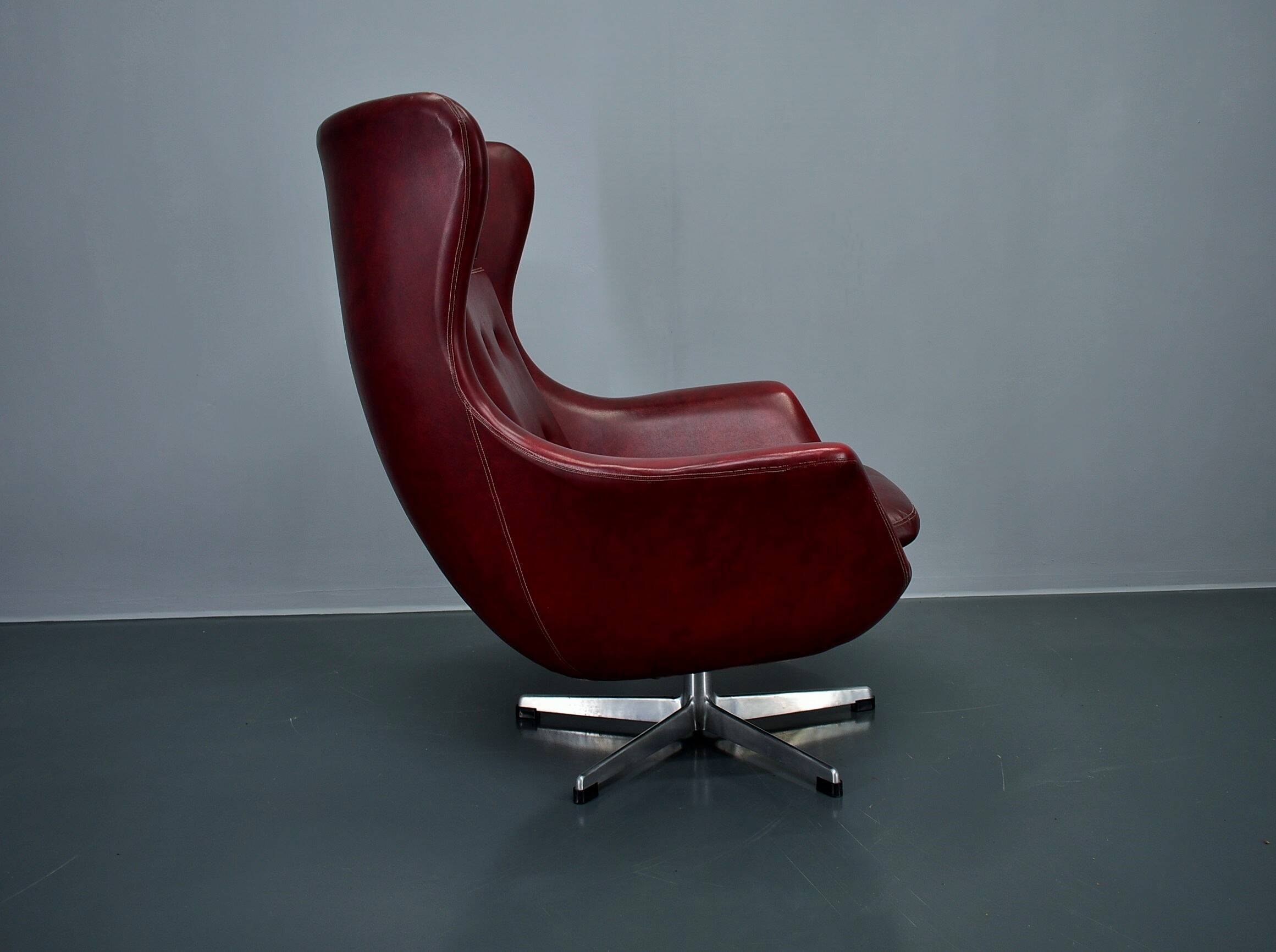Leather swivel armchair from Up Závody , 1960s