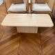 Minimalist design coffee table in unbleached travertine stone