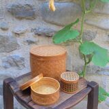 Trio of rattan boxes