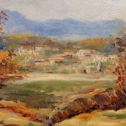 Oil painting on panel of a rural landscape, signed.