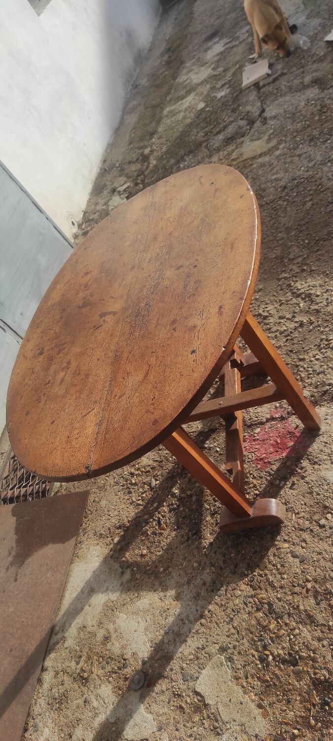 Old rustic oval folding wooden farmhouse table