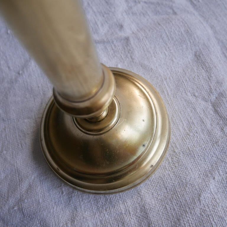 Brass candle holder with pusher