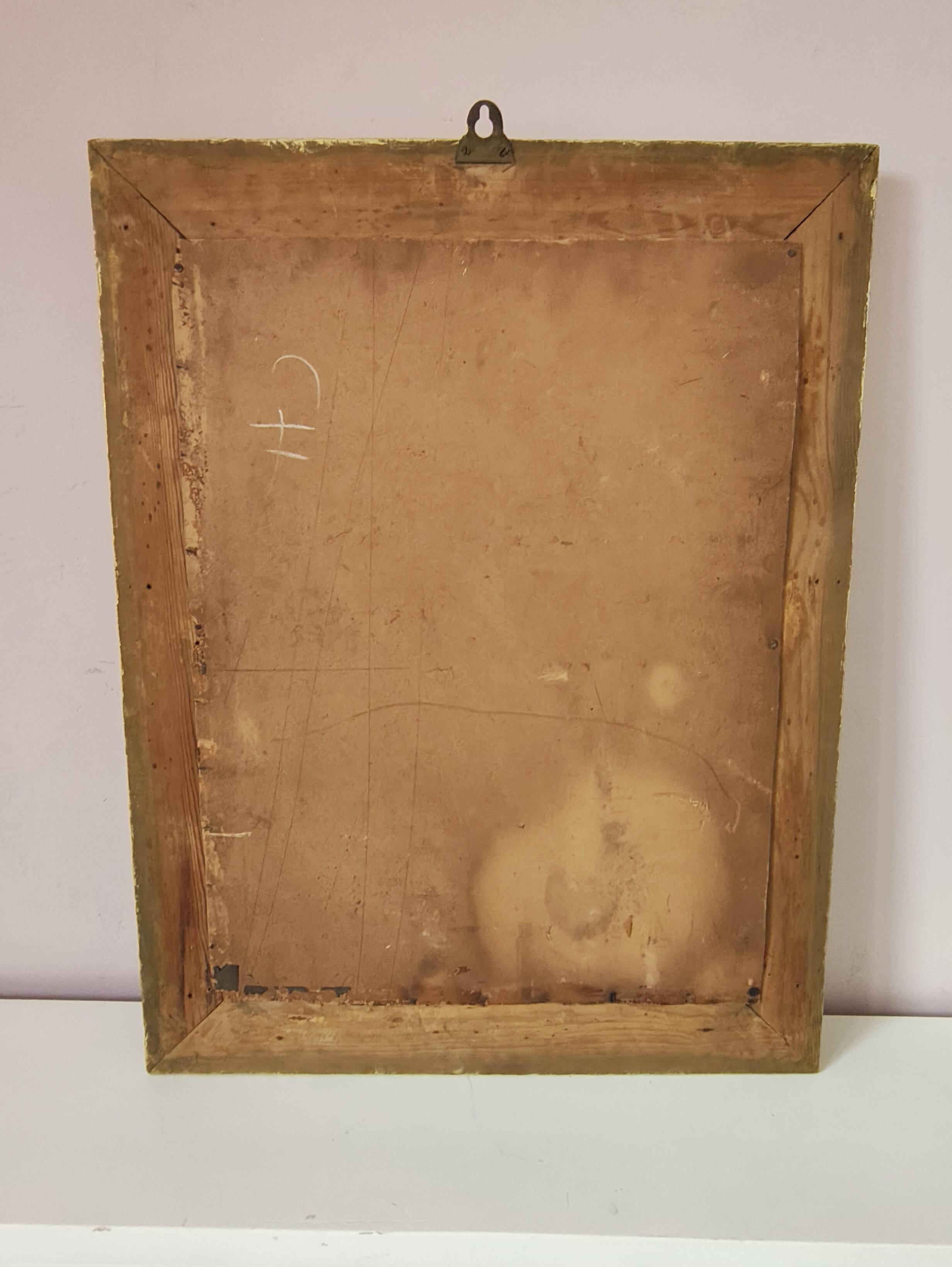 Richly carved antique gilded mirror
